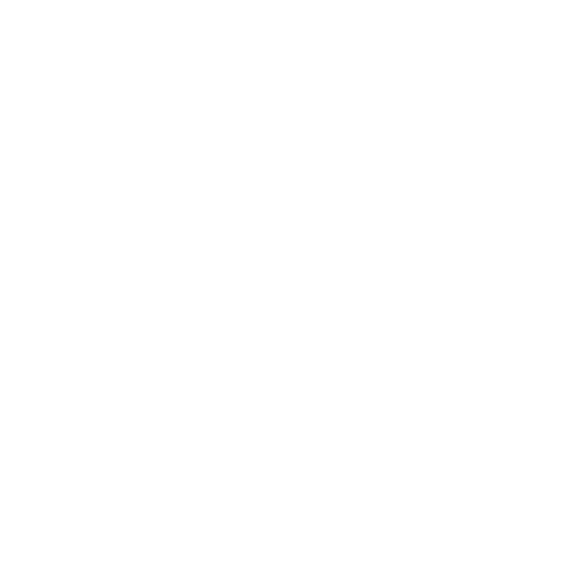 A cupcake with frosting, sprinkles, and a cherry on top.